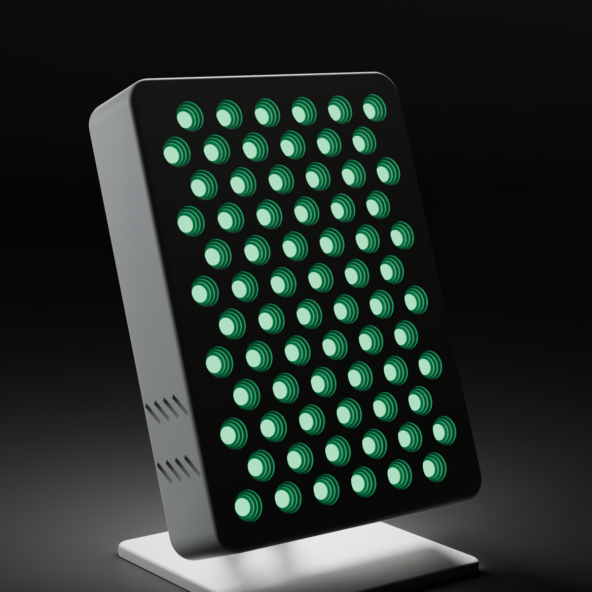 Three-quarter view of the DRKD Retreat 32 lit green in a dark room, showing the depth of the white housing, the hinged support arm and the square base plate.