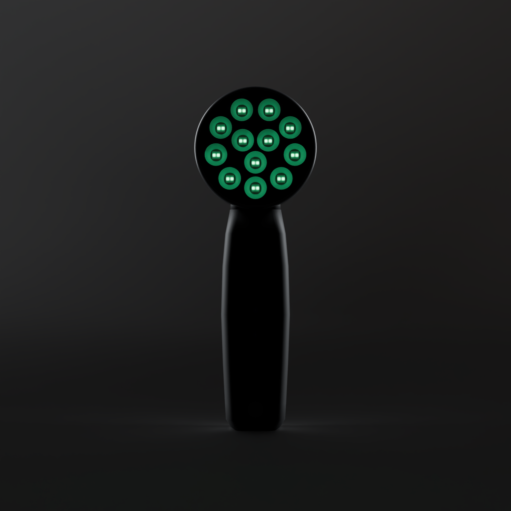 Front view of the DRKD Retreat 21 with all 12 LED wells lit green, each holding a dual-chip LED, on a black round head.