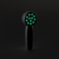 DRKD Retreat 21 at an angle with its 12 LED wells lit green, matte black housing with a round head and slim handle.