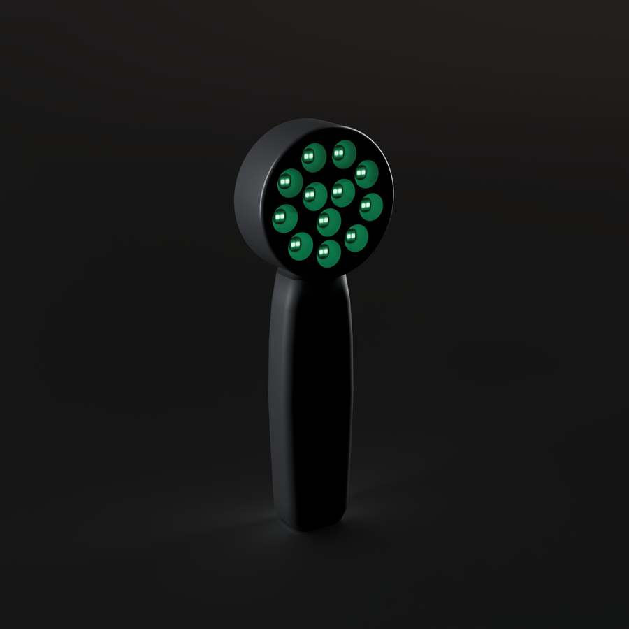 DRKD Retreat 21 at an angle with its 12 LED wells lit green, matte black housing with a round head and slim handle.