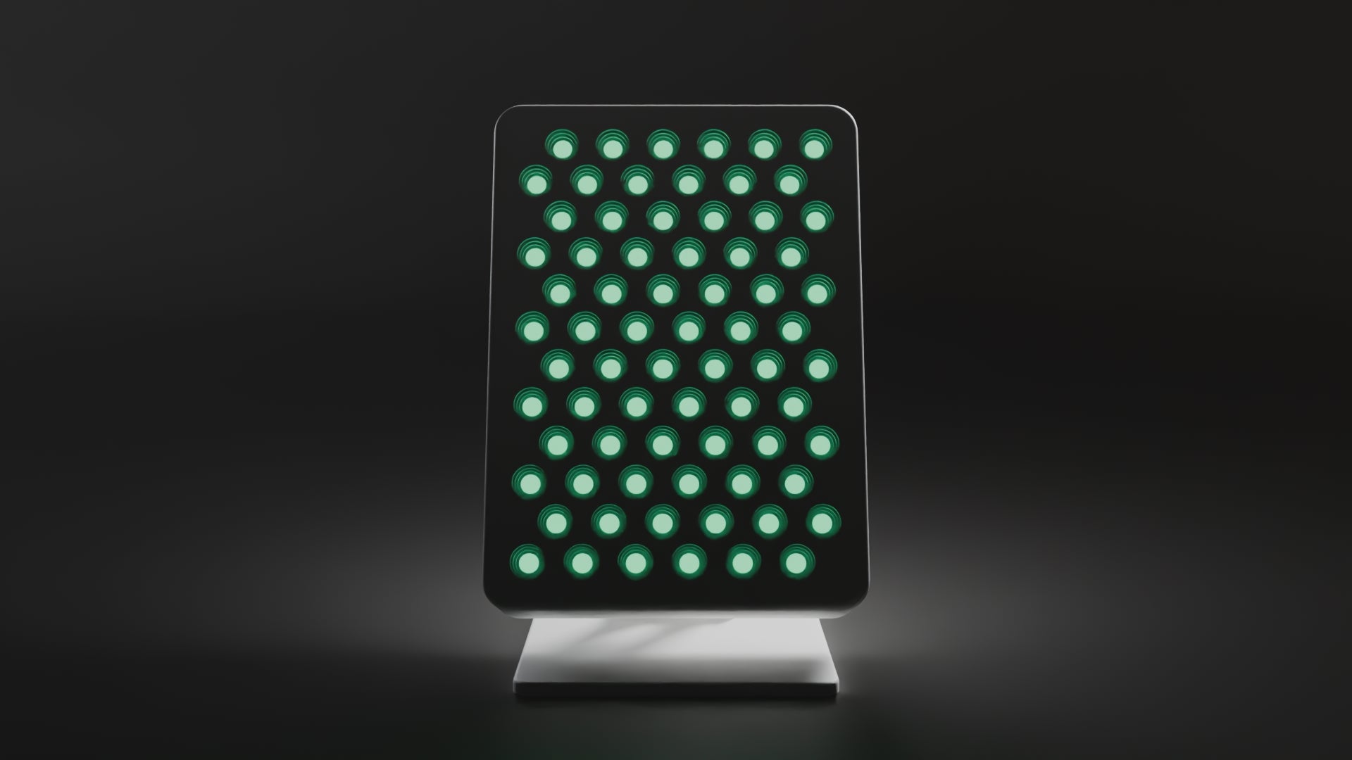 360-degree turntable of the DRKD Retreat 32 with its green LEDs lit, showing the front array, side profile, rear panel and stand.